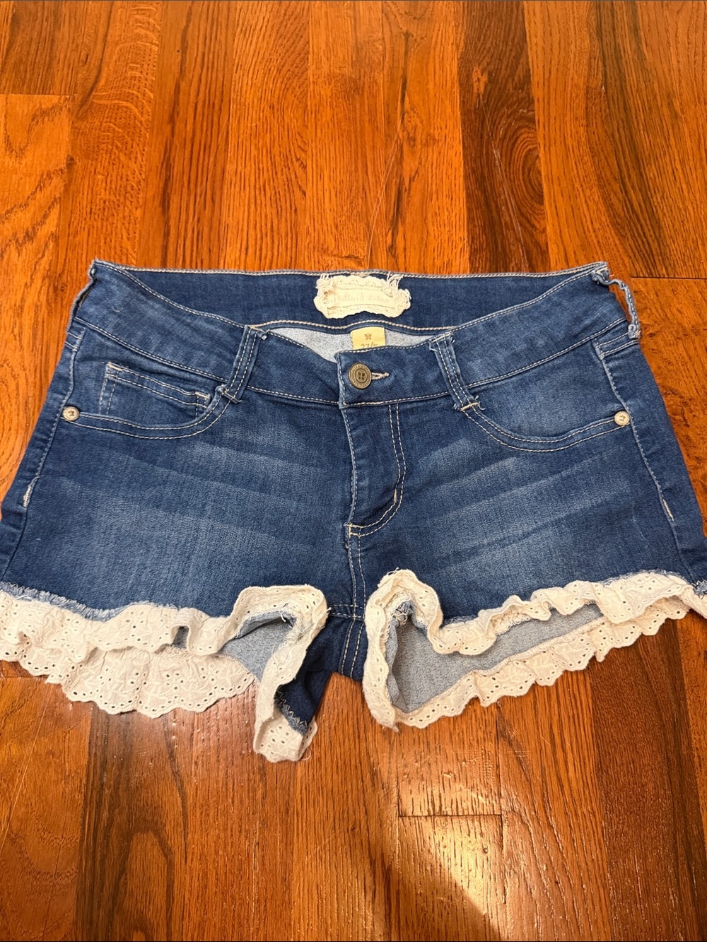 Altar'd State Blue Denim Shorts with Cream Lace Trim